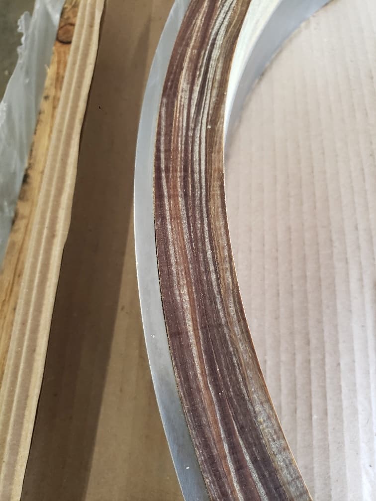 Bearing seal made with Lignum Vitae